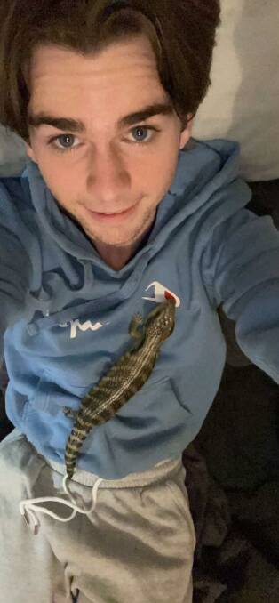 Rohan Cosgriff with a pet lizard. Picture supplied