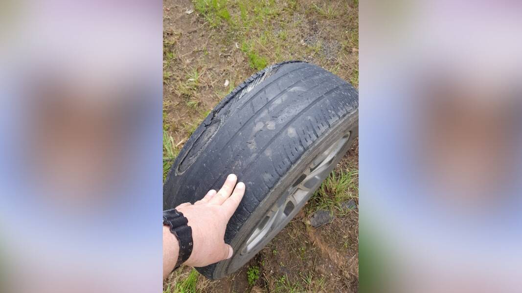 A motorist was assisted by Police on Monday before they discoved the poor condition of his faulty tyre. Picture by NSW Police