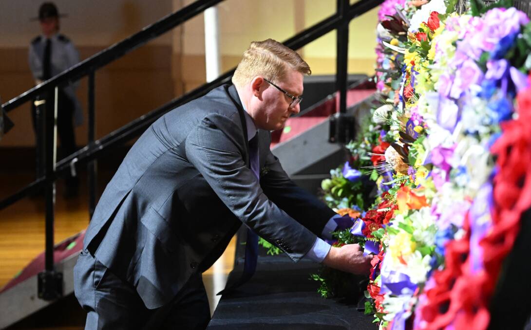 Legislative Council Member Anthony D'Adam lays a wreath at the Tamworth Anzac Day commemoration service. Picture by Gareth Gardner