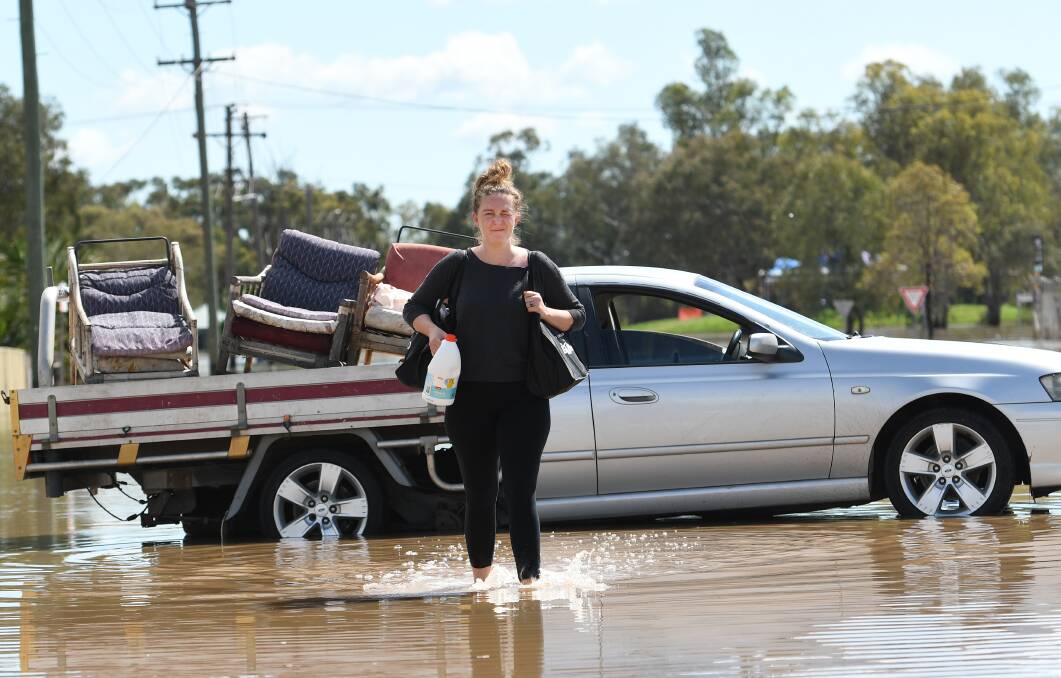 Lauren Mackley, who lives on Rosemary Street, said the flooding was "heartbreaking". Picture by Gareth Gardner