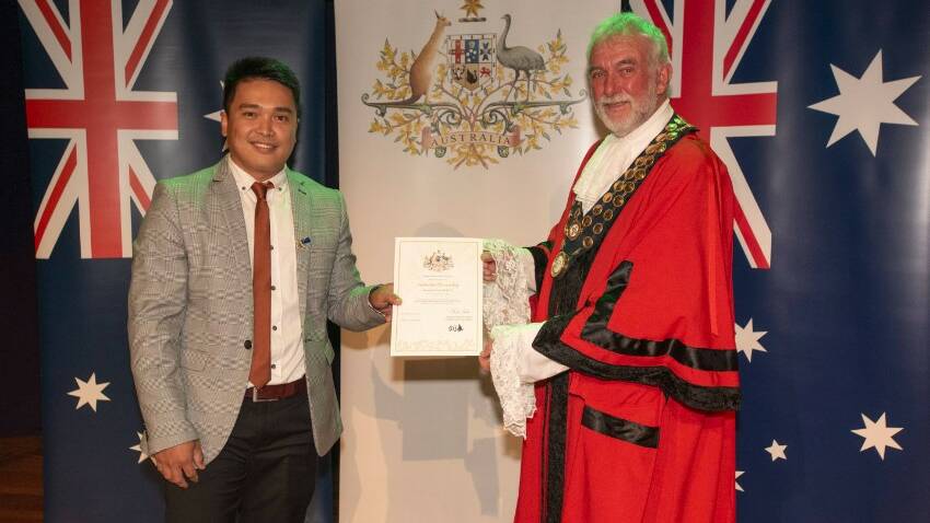 Adrian Pineda and Tamworth Regional Council mayor Russell Webb at the Australia Day citizenship ceremony earlier this year. Picture by Peter Hardin
