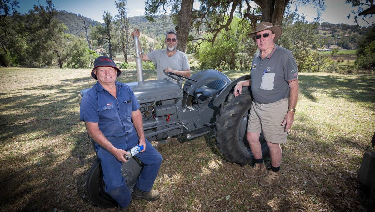 Paul Cox, Tony McCelland and Greg Davis are ready to welcome visitors to the Dungowan Village Fair. Picture by Peter Hardin