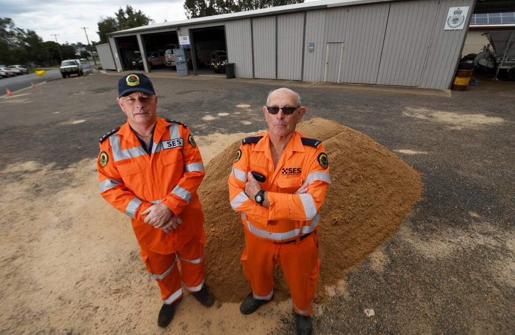 SES Gunnedah Unit Inspector Phill Miegel and operations officer Graeme Geyer brace for more rain. Picture by Gareth Gardner