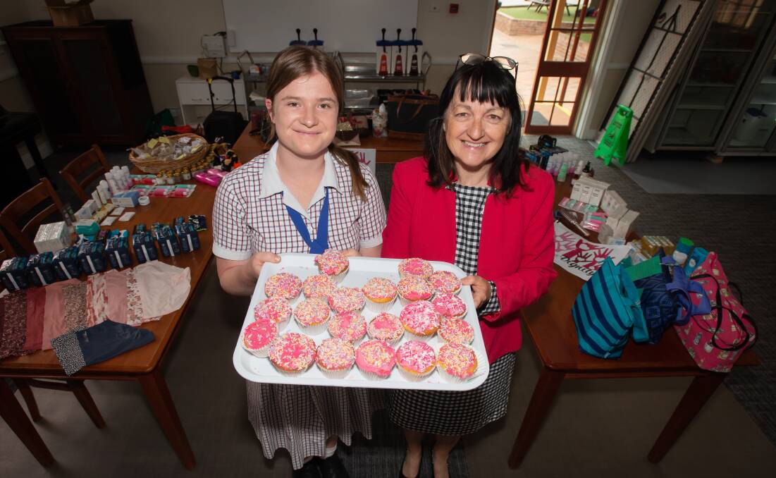 Calrossy Anglican School boarding student Grace Idner and teacher Maria Buster. Picture by Peter Hardin