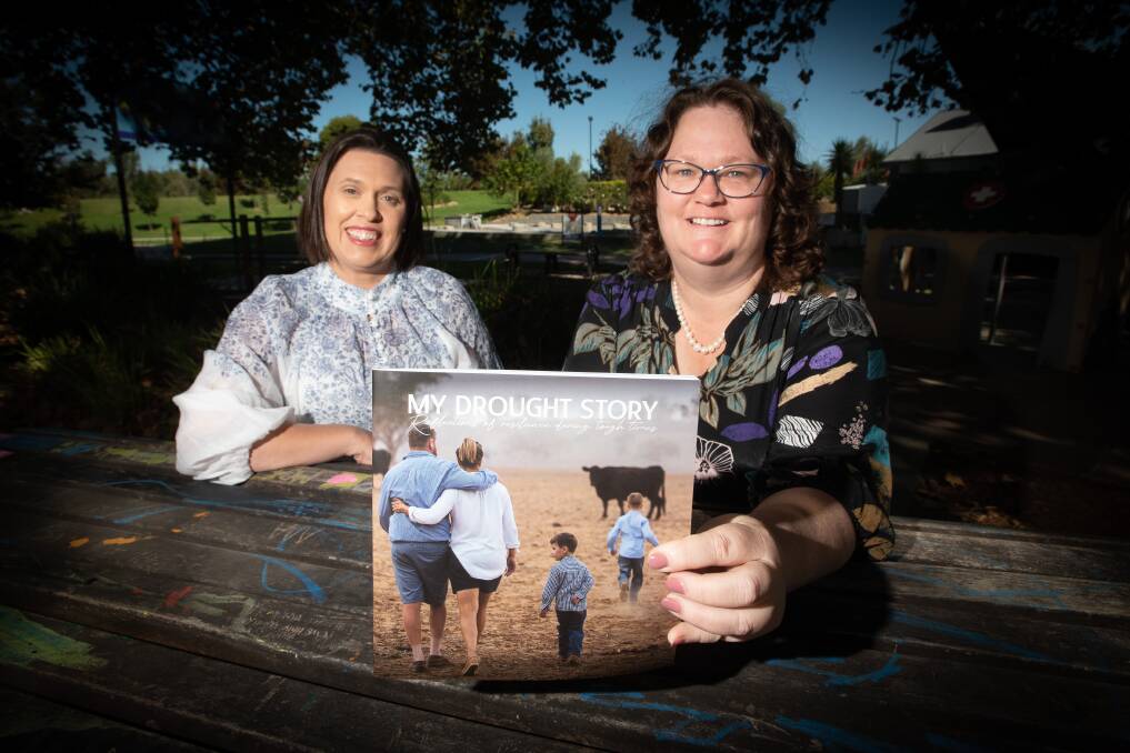 My Drought Story project lead Kate Arndell and farmer Karen Weller with the recently launched book. Picture by Peter Hardin