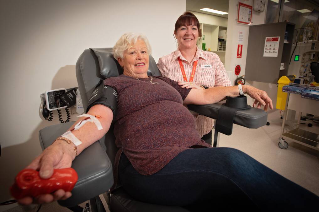 Lorraine Rennie, pictured with Tamworth Blood Donor Centre CSO Michelle Walker-Treda, has donated blood 500 times. Picture by Peter Hardin