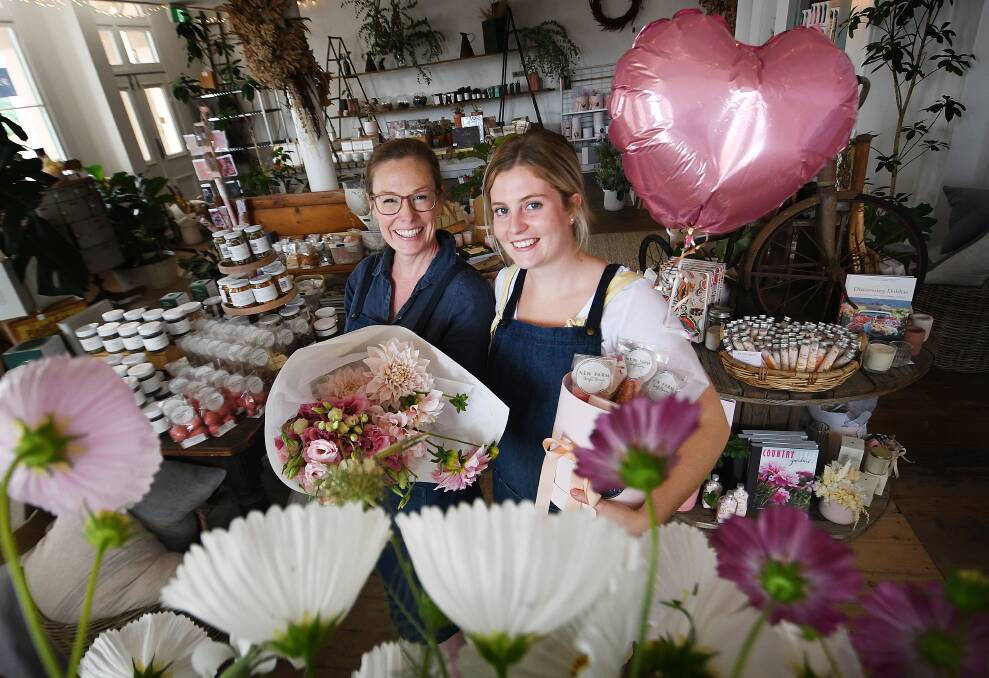 Botanique owner Drue Daly and Anna Sommers expect business to be better because Valentine's Day falls on a weekend. Picture by Gareth Gardner