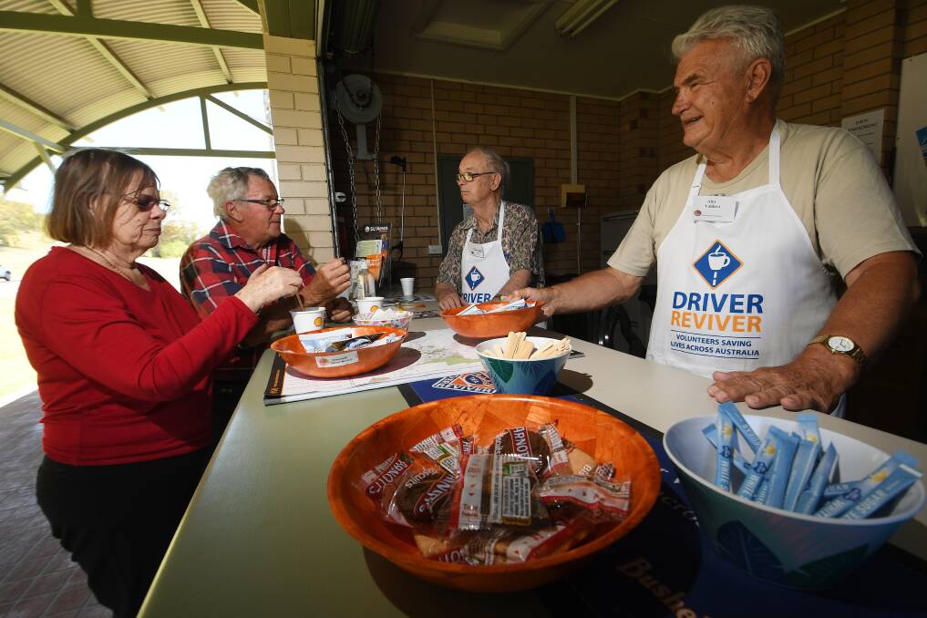 Fay and Tony Mills stopped off on their trip from Nundle to Tamworth to revive with a cuppa at the Driver Reviver kiosk on Armidale Road. Pictures by Gareth Gardner