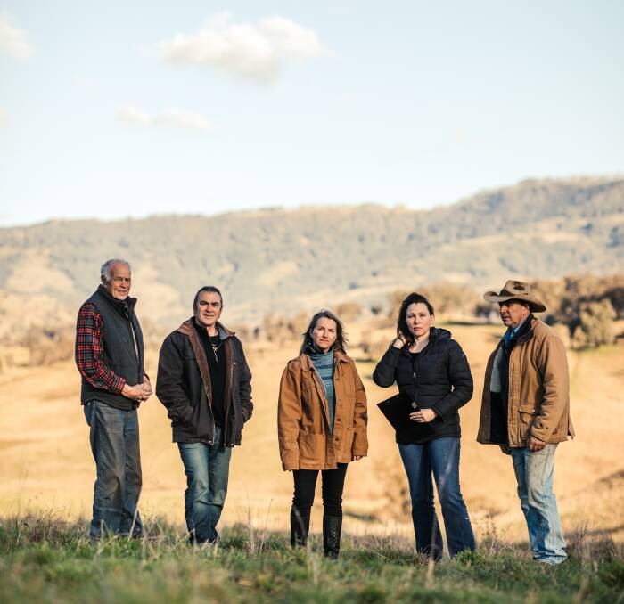 Hills of Gold Preservation Inc. members on one of the most impacted properties, Sylvester Cattle Company's Wombramurra Station, Ian Worley Snr, John Krsulja, Megan Trousdale, Alena Lavrushkina, and John Sylvester. Picture by Andrew Pearson