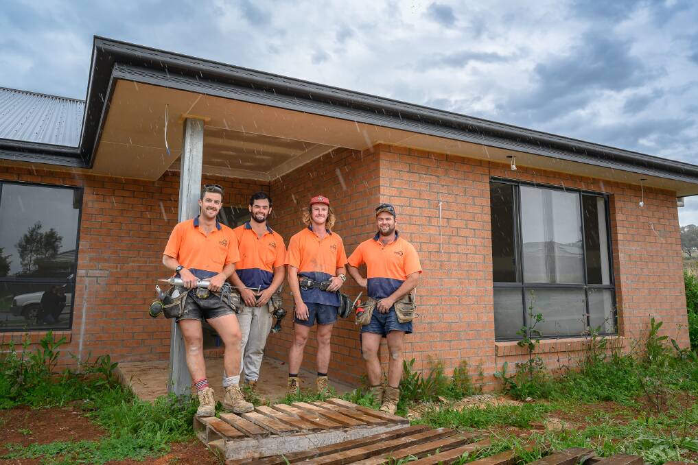 Jack Bark (right) with his team in North Tamworth. Picture by Mark Kriedemann
