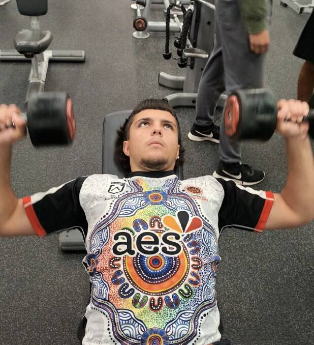 Chayse Shepherd, 16, lifts weights and does cardio and other agility exercises in the gym program run by Aboriginal Land Council's Matty Nean. Picture supplied