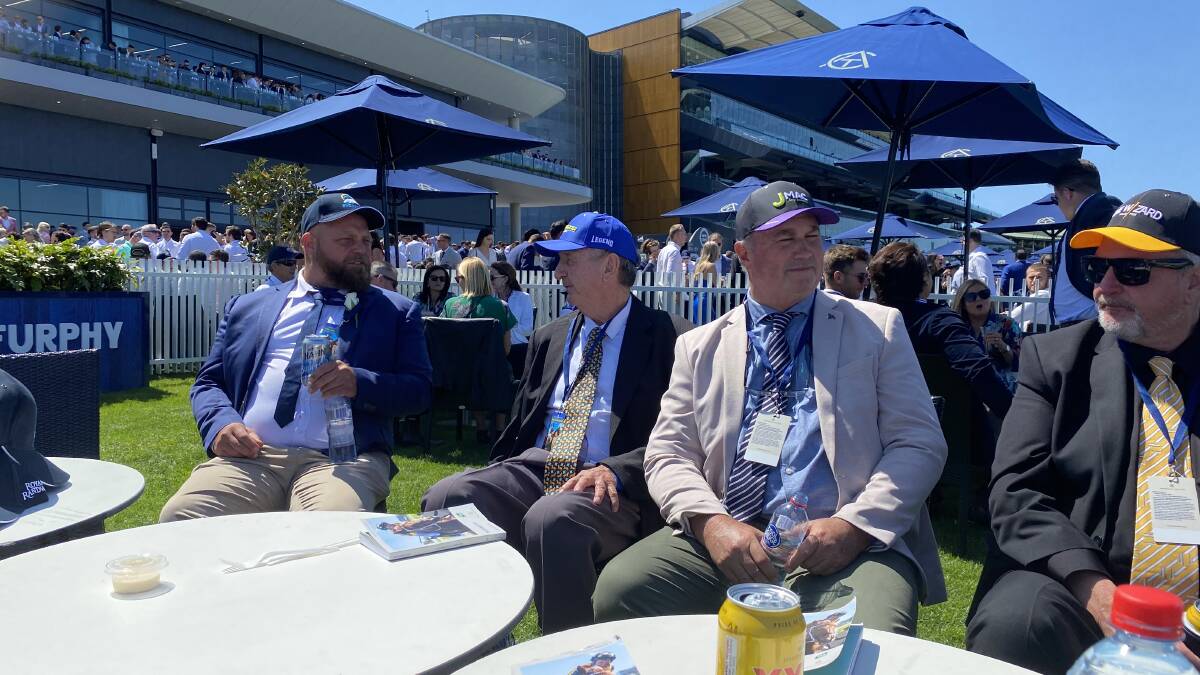 The Kosciuszko slot holders from Glen Innes had only their caps to protect them from the blaring sun while others kept cool and comfortable beneath outdoor umbrellas. Gavin Petersen, left, Tony Henderson, Phill Evans and John Crowhurst. Picture supplied