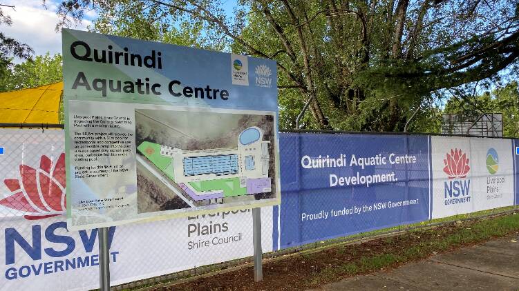 Signage and mesh fence covering wrapped around the Quirindi Aquatic Centre while construction gets started on $6.6 million upgrade. Photo provided.