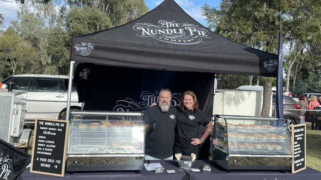 Brad Tisdell with fellow Nundle Pie Company co-founder Laura Pratt at the Currabubula Boutique Markets on May 7. Picture supplied