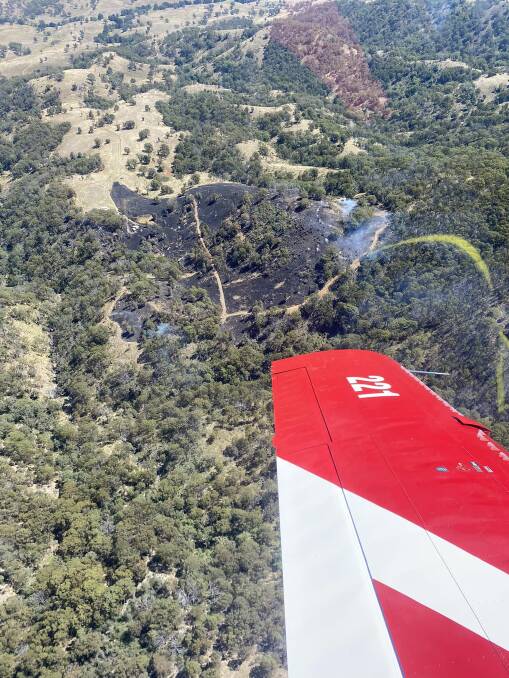 A fire near Hanging Rock 10km Southeast of Nundle burned 60 acres of forest, including a wool shed, but was quickly brought under control. Picture supplied by 