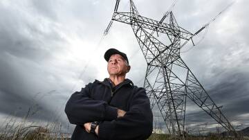 Valley Alliance president Tim White isn't happy with the state government's approach to building massive power lines through his neighbourhood. Picture by Gareth Gardner