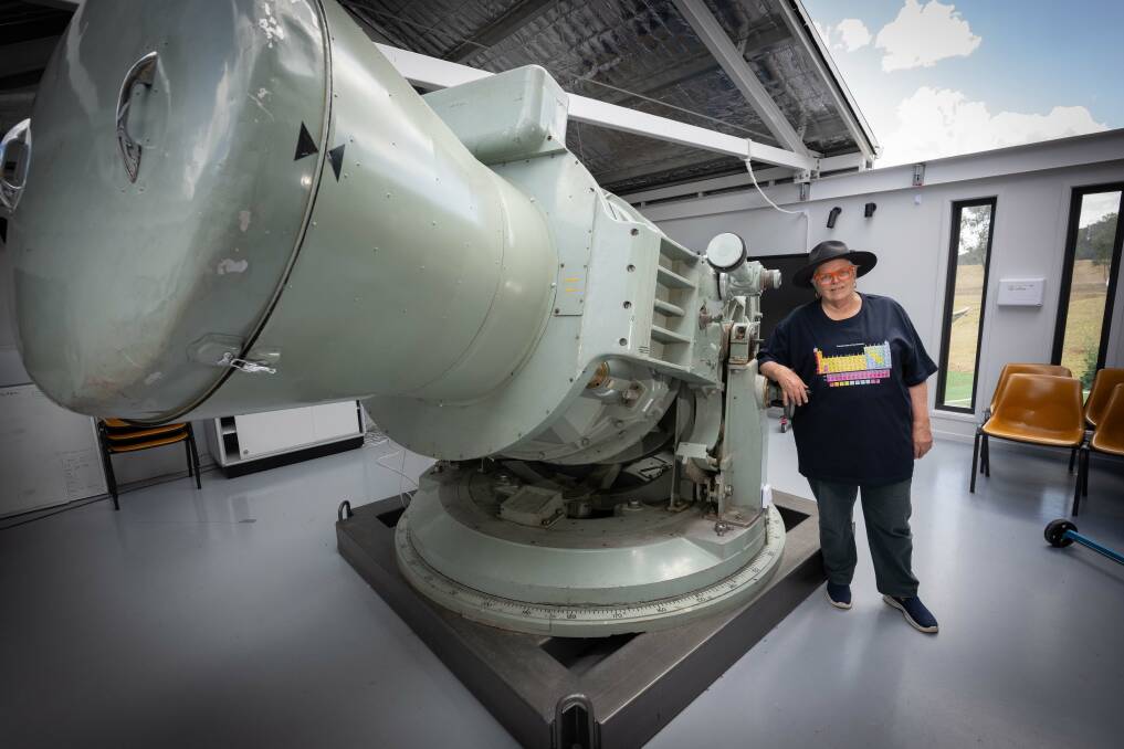 Dr Merrill Findlay with the Tamworth Regional Astronomy Club's Hewitt Camera telescope, one of only two such telescopes in the world. Picture by Peter Hardin 
