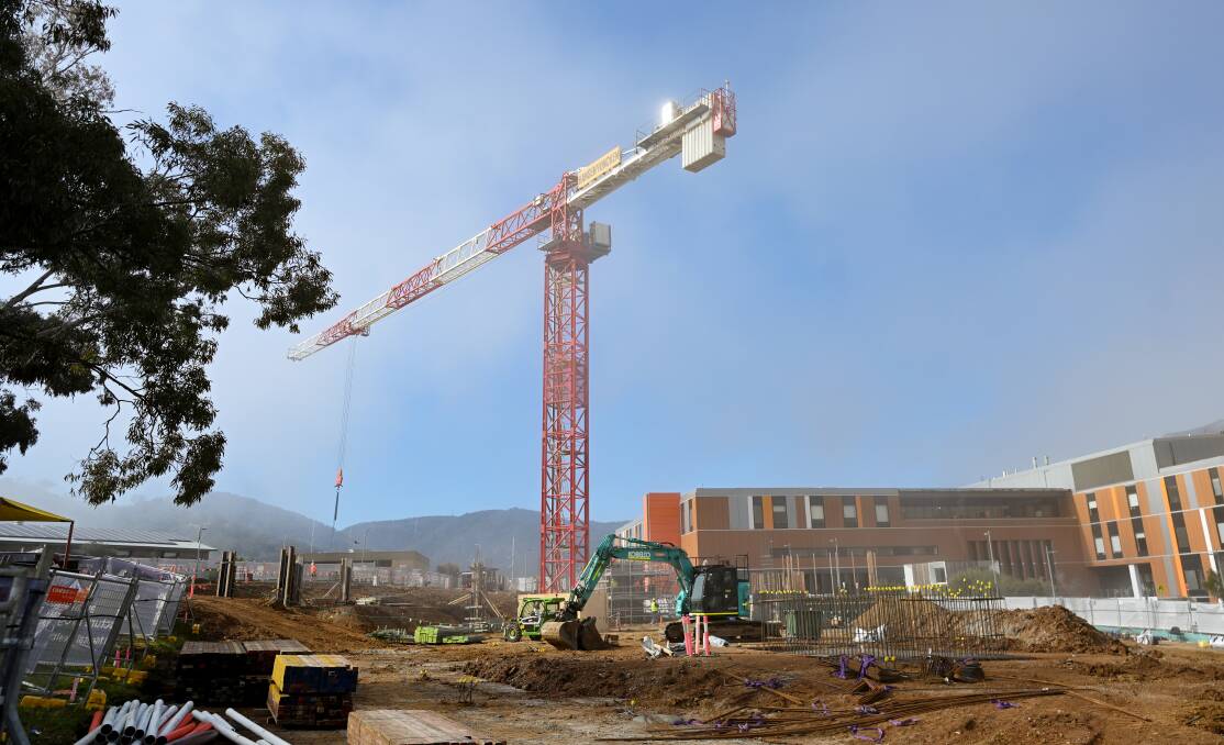 A giant crane towers above Tamworth hospital as works progress on the new mental health unit. Picture by Gareth Gardner