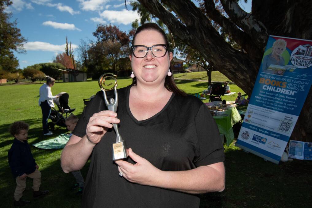 Co-owner of Walls Honey Co Katelyn Wall with the Australian Small Business Champion Award for best Agrilcultural Services recently awarded to her and her husband's Tamworth-based business. Picture by Peter Hardin