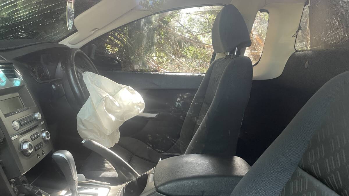 A deployed airbag could be seen inside of the ute. Picture by Jonathan Hawes