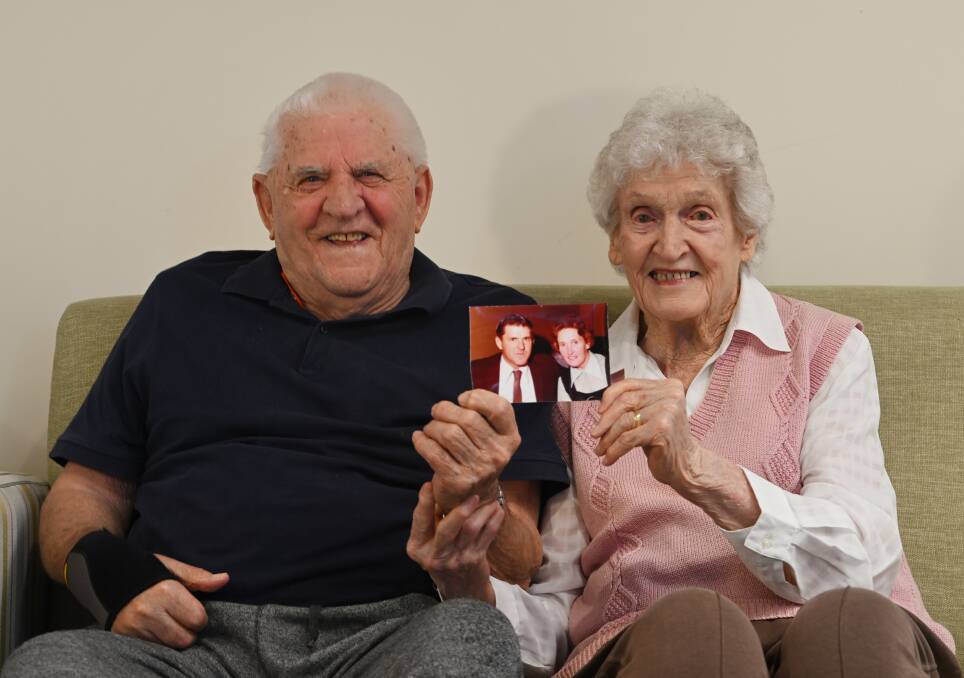 Don and Lorraine with a picture of themselves in their 40s. Picture by Gareth Gardner