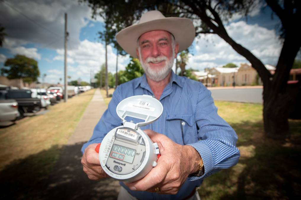 Tamworth Regional Council mayor Russell Webb with a new smart water meter. File picture by Peter Hardin