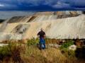 A farmer looks on over the Boggabri coal mine. File picture by Dallas Kilponen