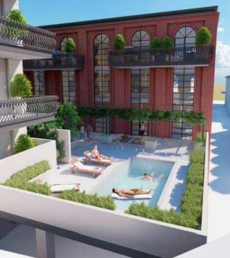 The scaled-back version of the development still includes a cafe, boutique brewery, courtyard, swimming pool and gym. Picture by NGH Consulting