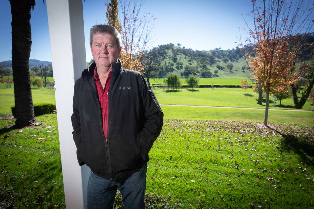 Dungowan Station co-owner Campbell McIntosh on the back veranda of his property, whose scenic view of the area's rolling hills contributes to his business' bottom line. Picture by Peter Hardin
