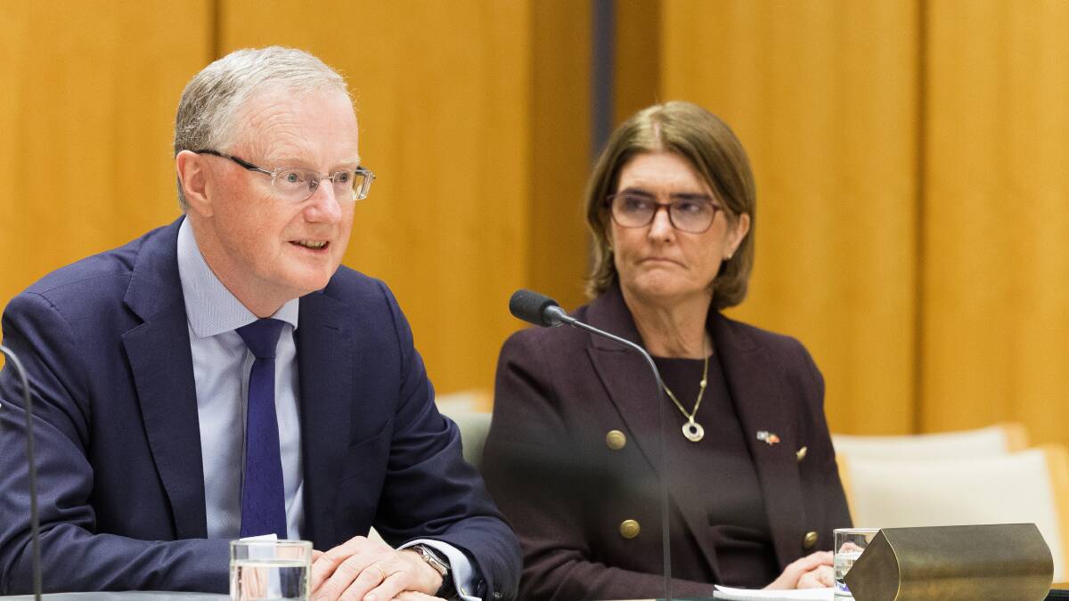 Reserve Bank of Australia governor Philip Lowe and incoming governor Michele Bullock at a parliamentary committee hearing in August. Picture by Sitthixay Ditthavong