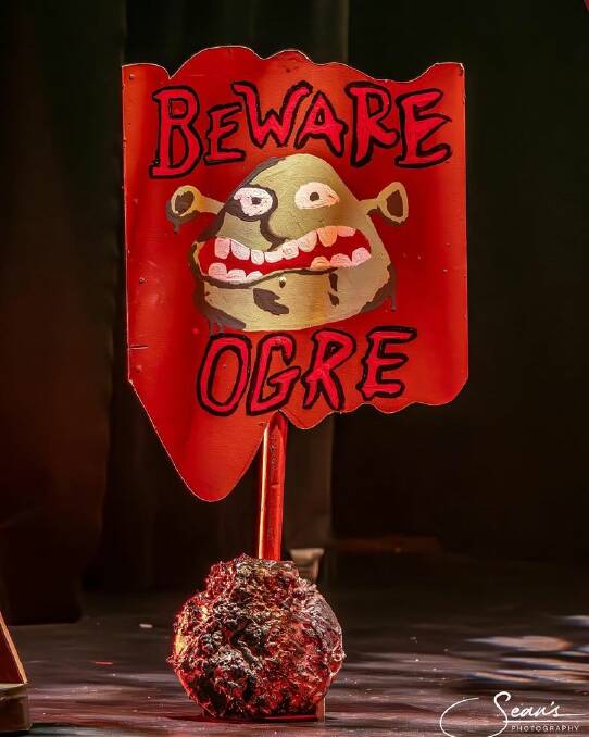 The famous beware ogre sign from the movie has been replicated as a prop for the musical. Picture by Tamworth Camera Club