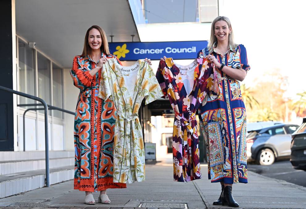 The Tamworth entrepreneurs, Stevie Reading and Deanna Chapman, showcase their robe designs near the Tamworth Cancer Council office. Picture by Gareth Gardner