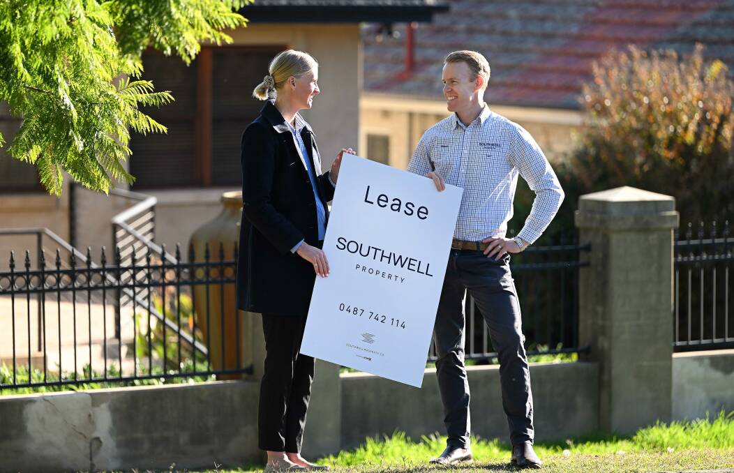 Husband-and-wife real estate duo Brooke and Stuart Southwell have found that the small suburbs such as Moore Creek are becoming more popular. Picture by Gareth Gardner