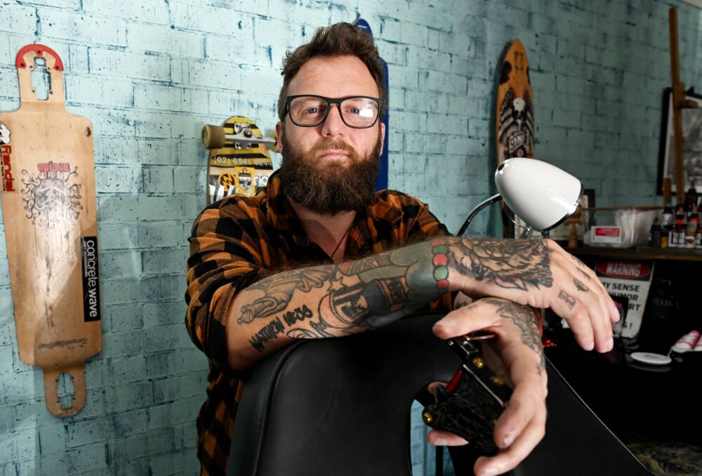 High Ground tattoo parlour owner and master licensee Ben Martin holds onto the traditions of tattooists past, while looking towards the future. Picture by Gareth Gardner