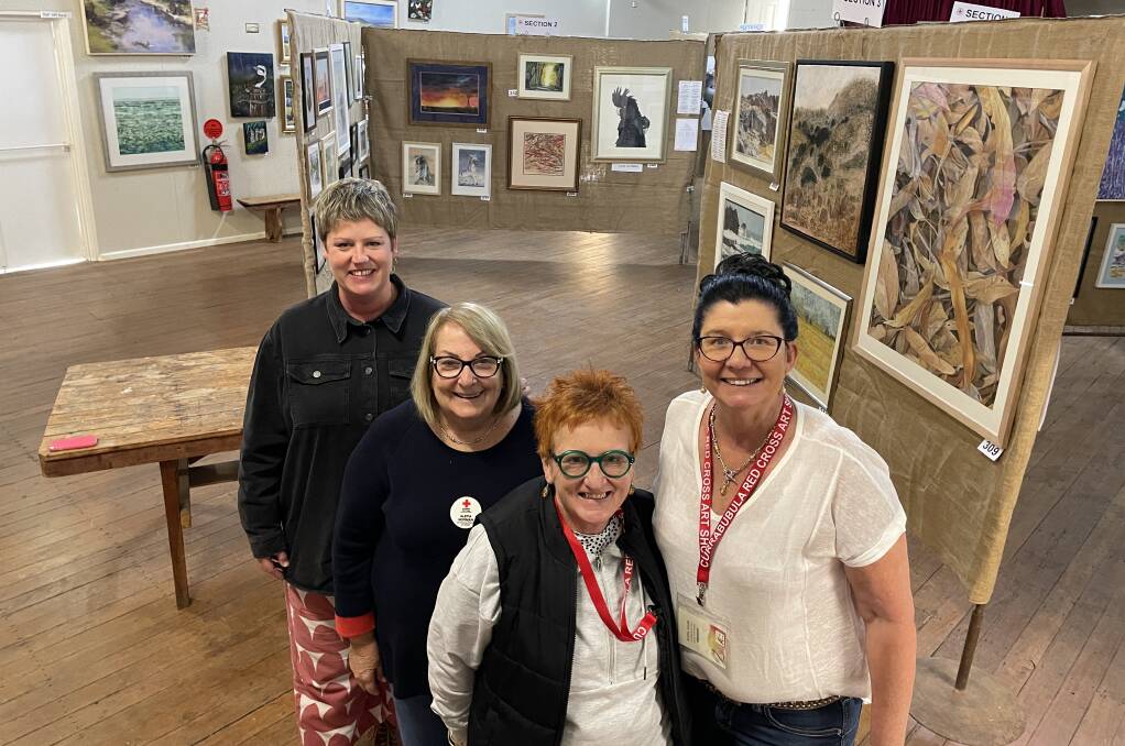 Currabubula Red Cross Art Show painting judge Kate Hofman from Weswal Gallery, with committee members Aletia Norman, Linda Coffey and Kathy Smith. Picture by Simon Chamberlain.