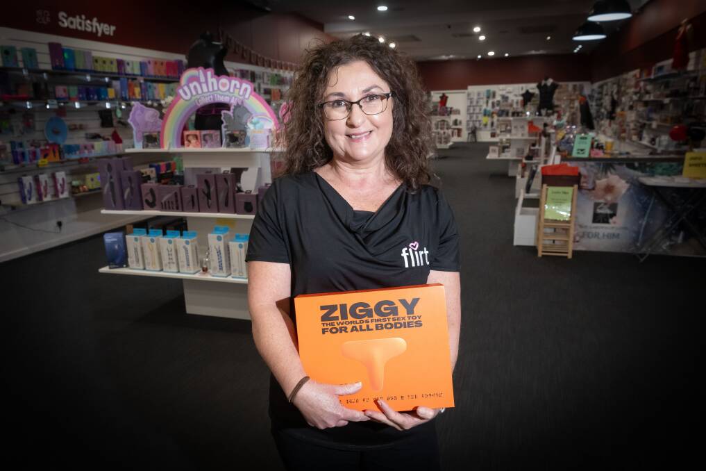 Flirt Tamworth store manager Stephanie Constable holds up 'The Ziggy' the first inclusive vibrator designed for all bodies. It is designed to be flexible and has braille at the bottom of the box. Picture by Peter Hardin 