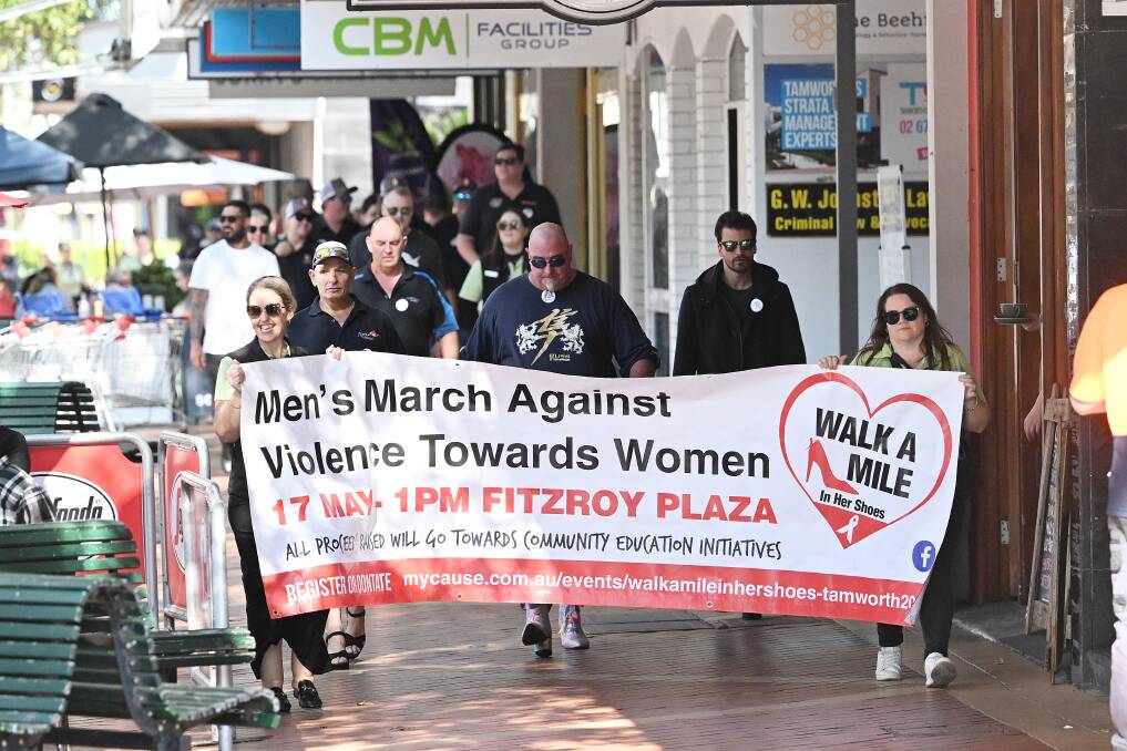 The men were supported by a large crowd of women and support services. Picture by Gareth Gardner