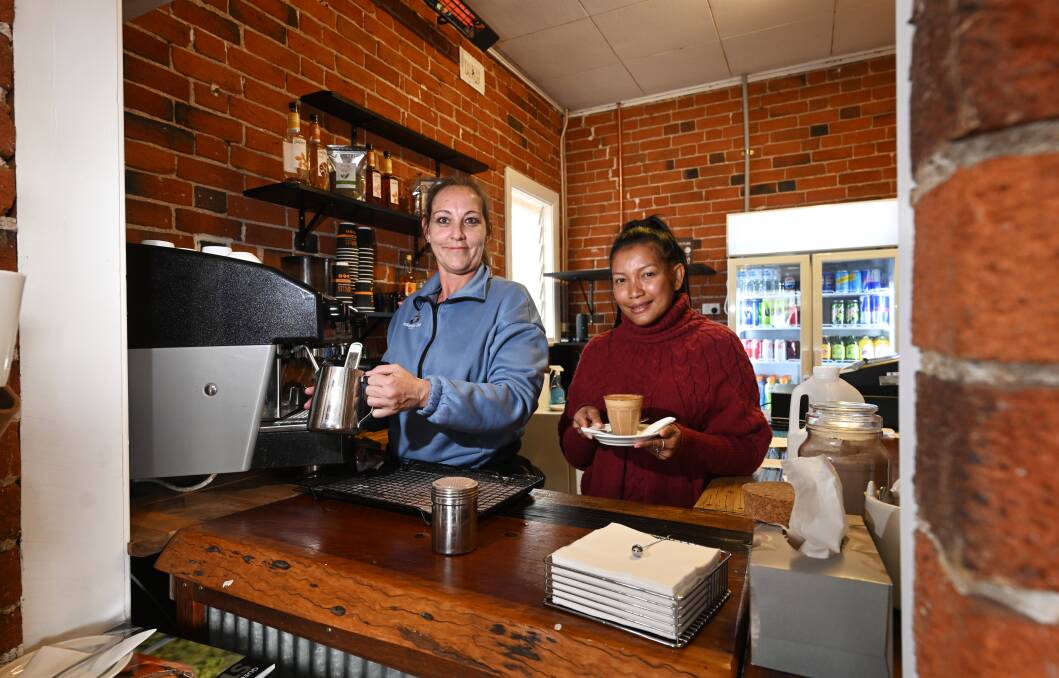 Andaman Sea Cafe barista Jenna Styles is on deck whipping up delicious coffee for customers, while co-owner Nursa Sulong greets customers with a warm smile. Picture by Gareth Gardner