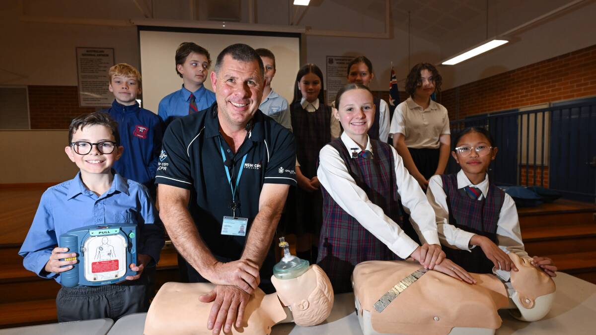 Cameron McFarlane marked a milestone on Thursday August 17, by teaching his 50,000th student how to perform CPR at Tamworth West Public School - the school where he originally kicked off the program in 2011. Picture by Gareth Gardner