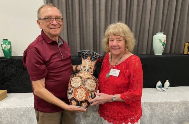 South Australian antique dealer Eric Miles, Golden Grove, and Tamworth Antique Fair organiser Helen Brennan, with a large Japanese Imari vase from the Edo period, c.1850. Picture by Emma Downey