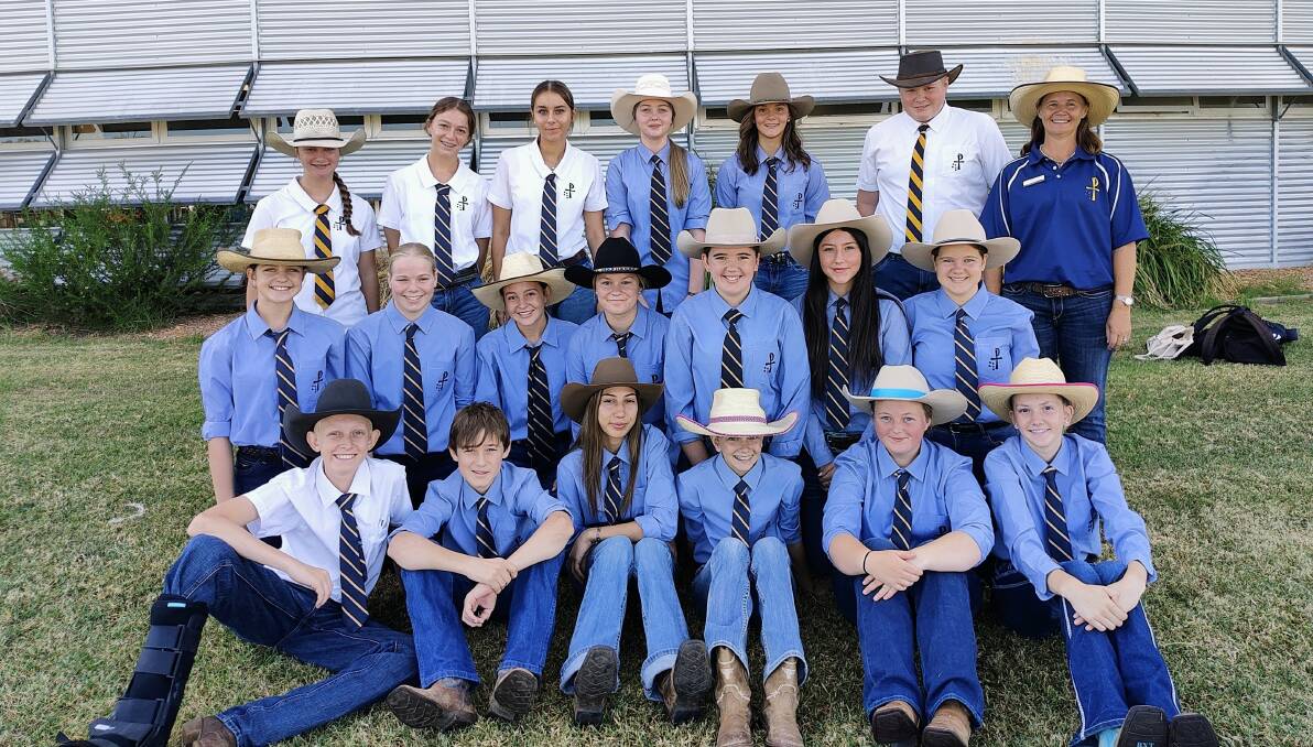 McCarthy Catholic College agriculture teacher Kylie Bailey (back, farm right), with the school's 2024 Tamworth Show team. Picture supplied