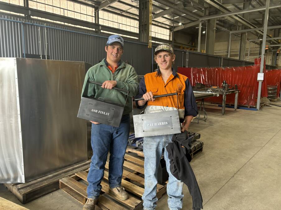 Farrer Memorial Agricultural High School Year 10 students Ash Finlay and Pat Harris with their completed tool boxes. Picture supplied