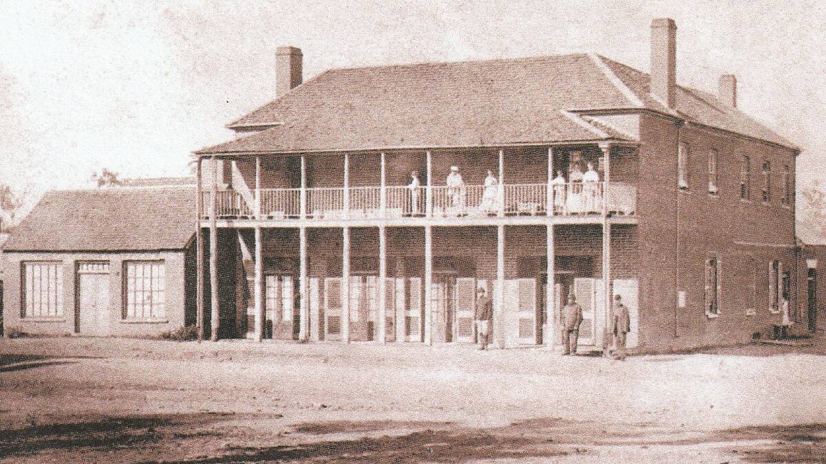 The Northern Police District headquarters (1862-1872), situated near the present Target Store in Peel St. Superintendent Garland's family members on top floor, police force members below. Picture supplied.