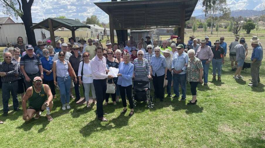 Member for Tamworth Kevin Anderson with more than 50 Barraba residents, who presented their local member with a 1000-signature petition to get a new doctor into town. Picture supplied by the office of Kevin Anderson