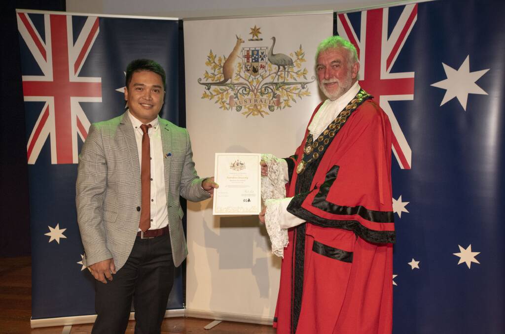 Adrian Pineda from the Philippines became an official citizen at a ceremony on Australia Day in 2022. Picture by Peter Hardin, from file.