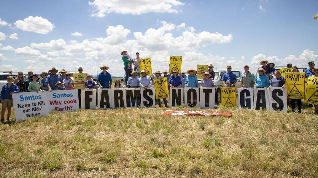 About 70 farmers and community members gathered in Gunnedah recently for a peaceful protest against coal seam gas exploration by Santos. Picture Supplied