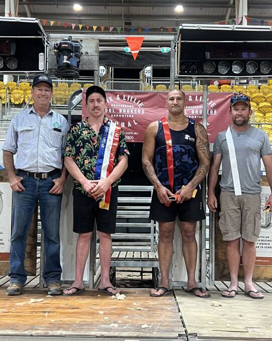 Long-time Sheep Steward, Dave Hallam, with the Open winners of the Fox & Lillie Speed Shearing event, 1st Jovan Taki, 2nd Stacey Te Huia and 3rd Jeremy Newberry.