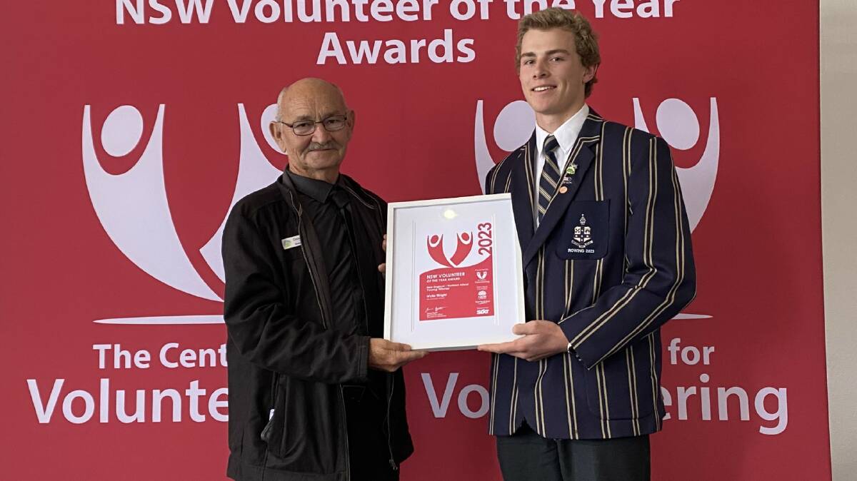 TAS student Wylie Wright receives the award for Young Volunteer of the year. Picture supplied.