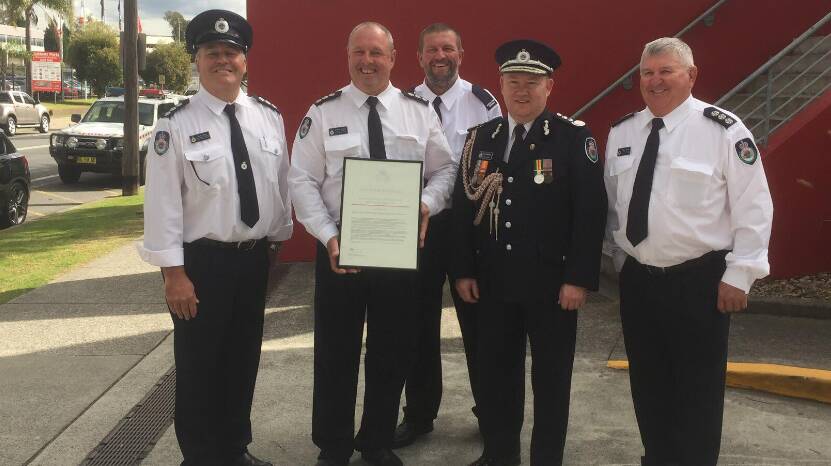 Richard Scilley (second from left) has been awarded an Australian Fire Service Medal (AFSM). Picture from NSW Fire Service Facebook 