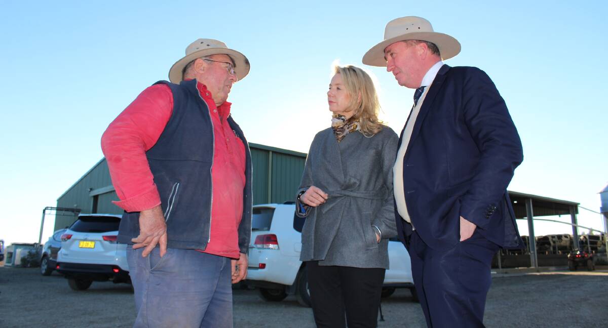 New England MP Barnaby Joyce and the Minister for Agriculture Senator Bridget McKenzie discussing ongoing drought conditions with a local farmer.